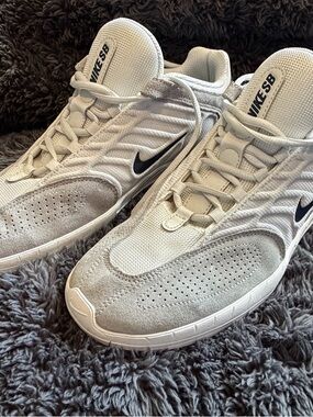 Nike white and black sneaker label visible - US 11